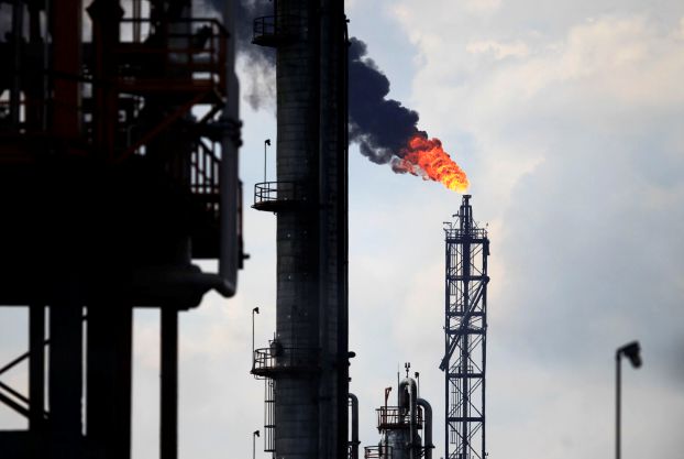 File photo of excess natural gas is being flared at a flare stack at the refinery in Tula