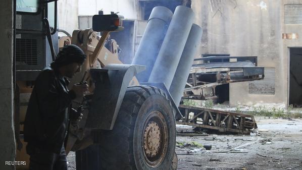 Shamiyah Front fighters fire locally made shells towards forces loyal to Syria's President Bashar Al-Assad in the old city of Aleppo