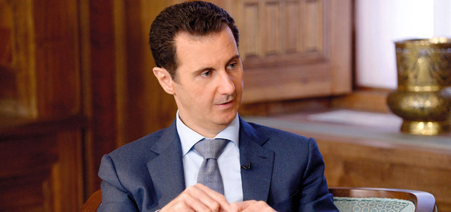 الأسد: الحكومة الانتقالية يجب أن تشمل النظام والمعارضة