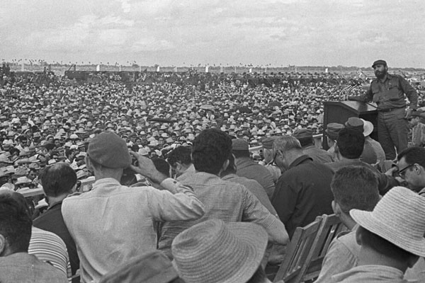 FILE - In this Oct. 1967 file photo, Cuba's leader Fidel Castro, top right, delivers a speech during a rally in Bayamo, Cuba. Castro has died at age 90. President Raul Castro said on state television that his older brother died late Friday, Nov. 25, 2016. (Prensa Latina via AP Images, File)