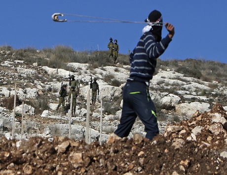 الفلسطينيون يحيون ذكرى انتفاضة الحجارة بمسيرات غاضبة