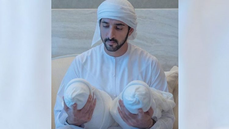 حمدان بن محمد في أول صورة مع التوأم راشد وشيخة