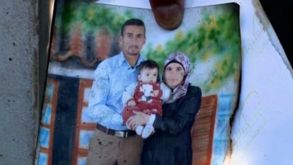 وفاة والد الرضيع الفلسطيني الذي قتل حرقا في الضفة الغربية