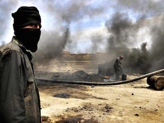 «داعش» يحرق منازل أهالي الموصل